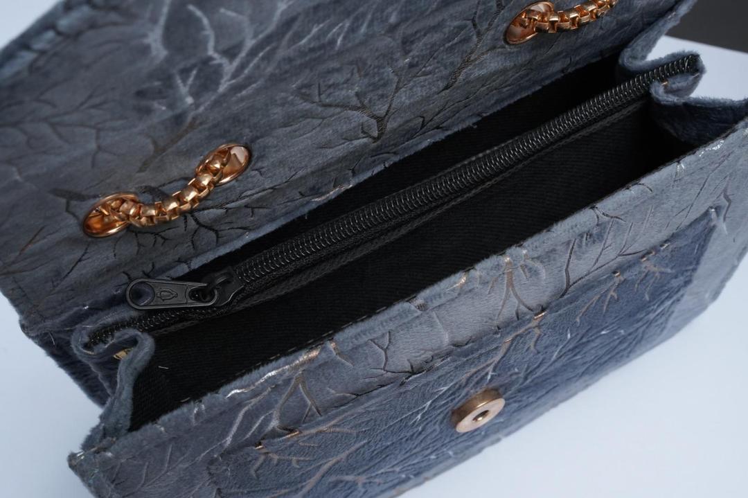 Woman's velvet Textured purse with chain