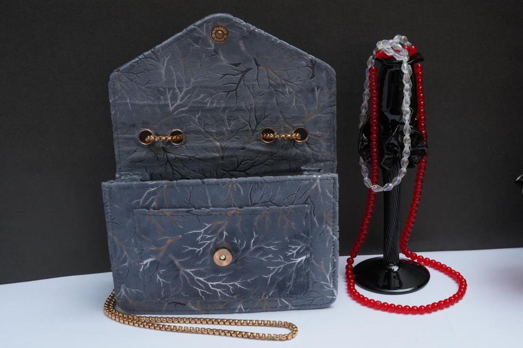 Woman's velvet Textured purse with chain