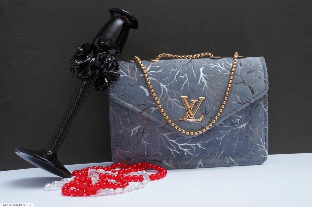 Woman's velvet Textured purse with chain