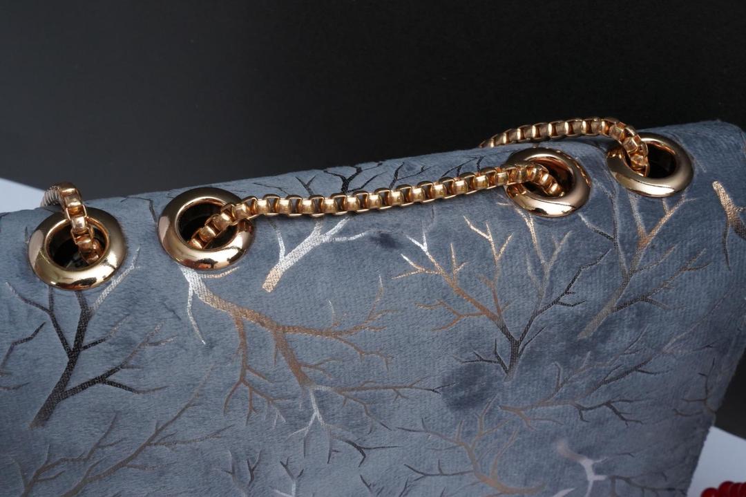 Woman's velvet Textured purse with chain