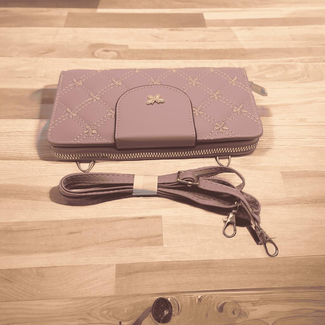 Woman's pu leather embroidered clutch