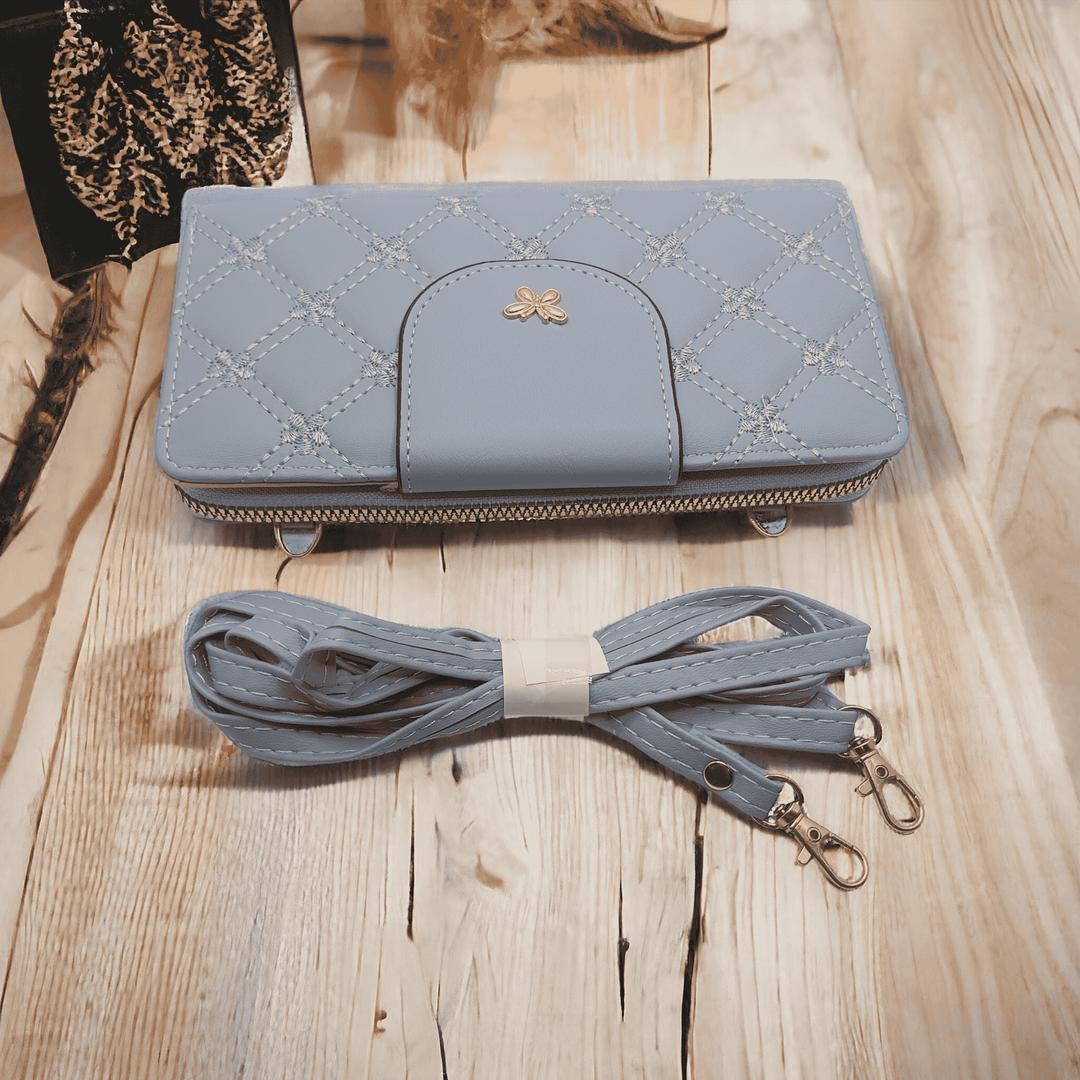 Woman's pu leather embroidered clutch