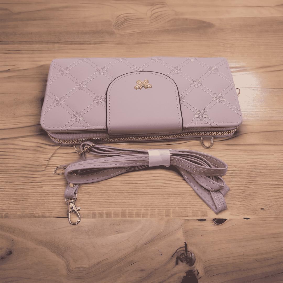 Woman's pu leather embroidered clutch